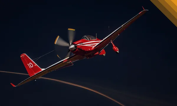 Red propeller plane climbing on a dark sky for the Aviator crash game on SkyFair